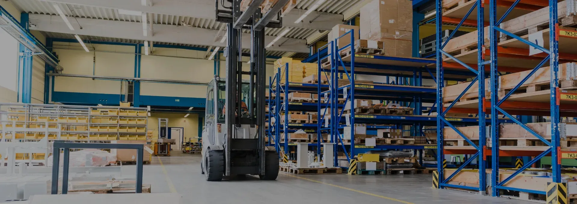 KAMAI warehouse hall with racking and pallets